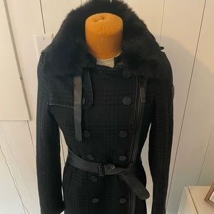 Gorgeous black winter jacket with a subtle blue plaid.